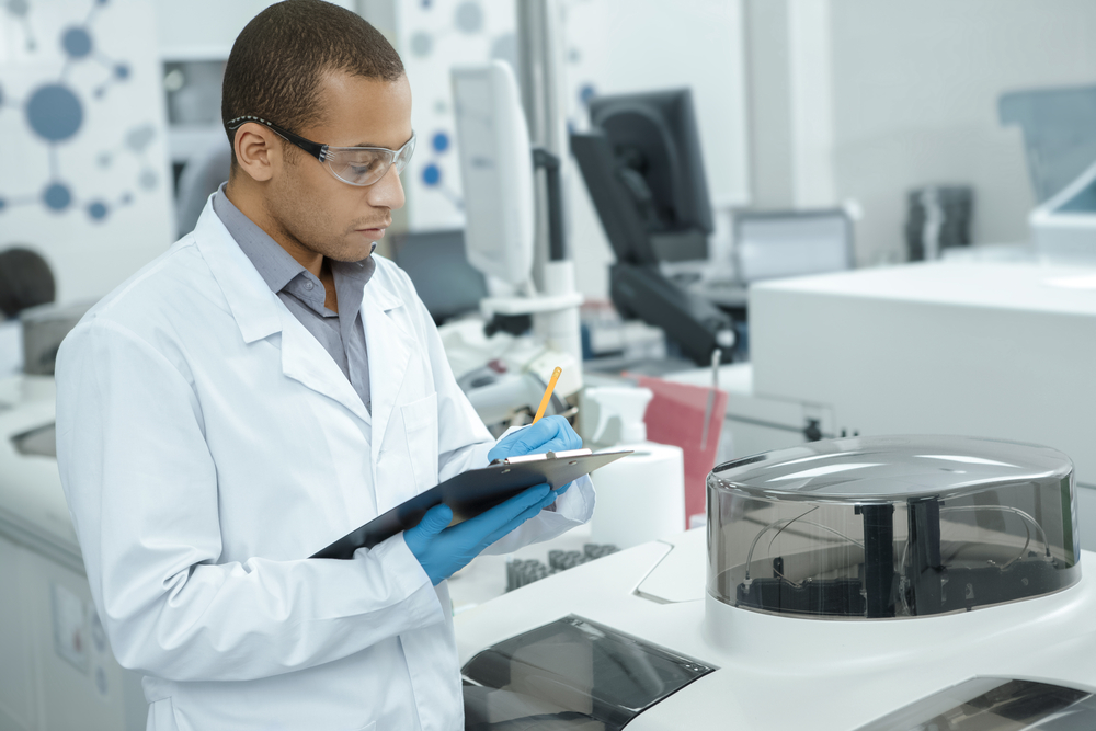 A scientist holding a clipboard